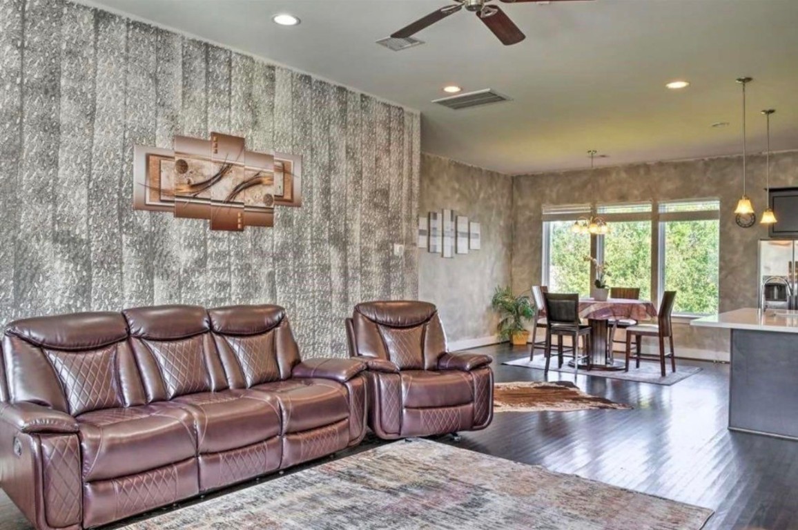 2107 Stuart Street Houston, TX 77004 - Photo 10 of 30 a living room with furniture and a large window