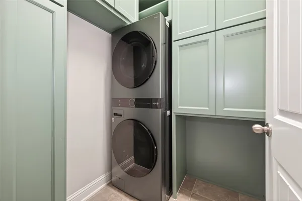 a spacious bathroom with a shower sink and mirror