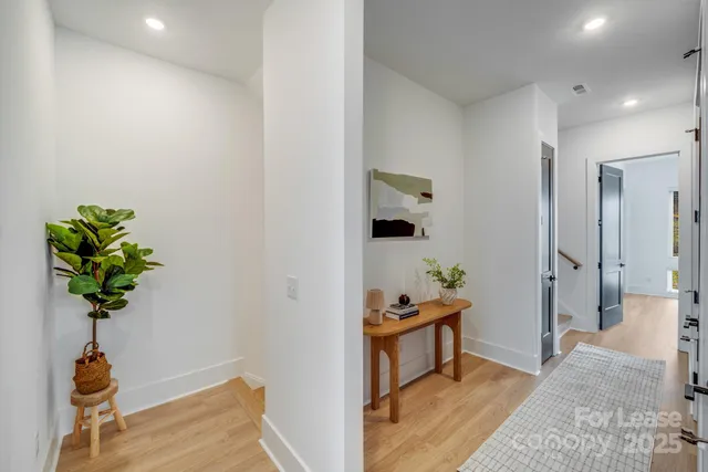 a kitchen with a table and chairs