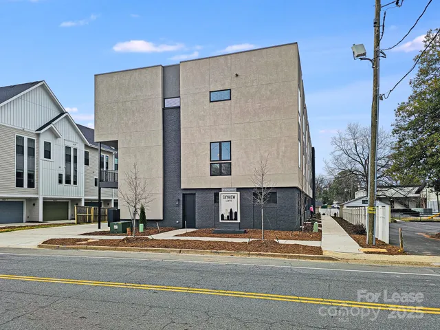 a view of a balcony with wooden floor
