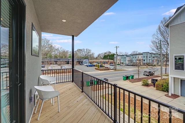 a balcony with hardwood
