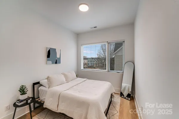 a bathroom with a double vanity sink mirror and