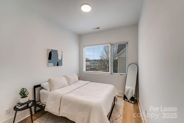 a bathroom with a double vanity sink mirror and