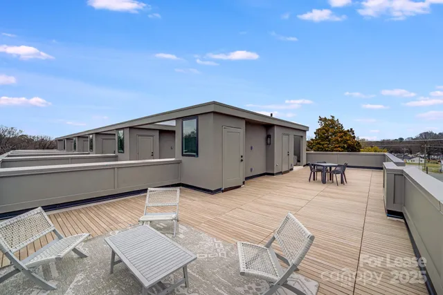 a view of swimming pool with lounge chair