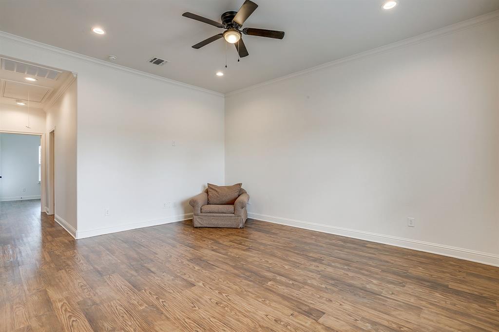 2706 James Road Granbury, TX 76049 - Photo 14 of 23 wooden floor in an empty room with a window