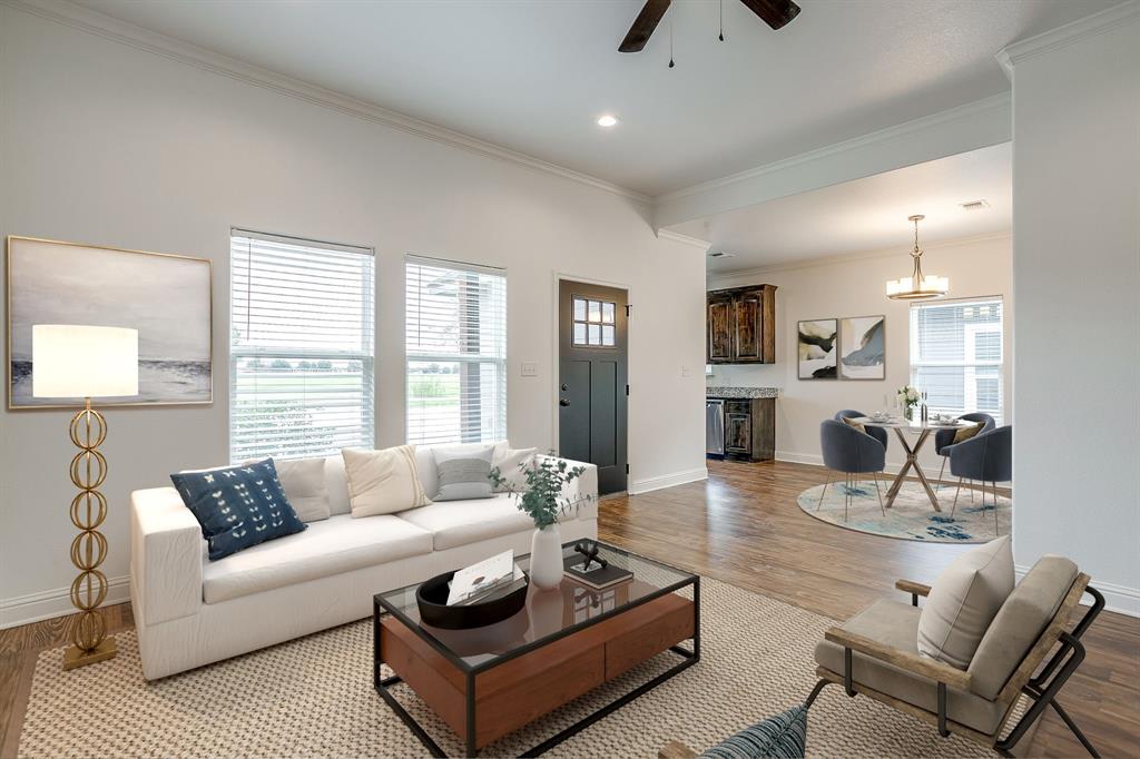 2706 James Road Granbury, TX 76049 - Photo 16 of 23 a living room with furniture and a large window