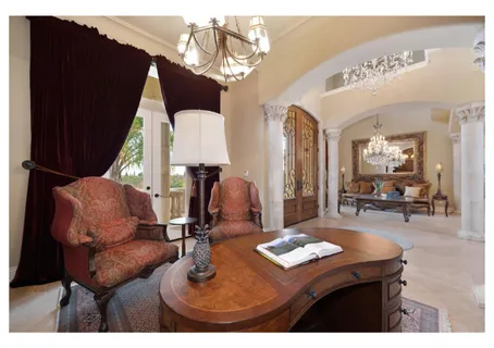 a kitchen with stainless steel appliances kitchen island granite countertop a table and chairs