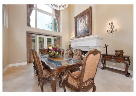 a kitchen with stainless steel appliances kitchen island granite countertop a sink and cabinets