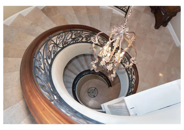a view of a dining room with furniture and a floor to ceiling window