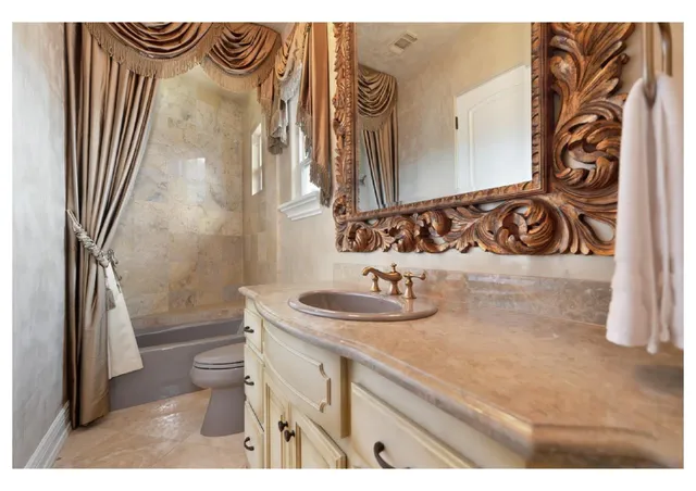 a bedroom with a bed next to a window with outer view