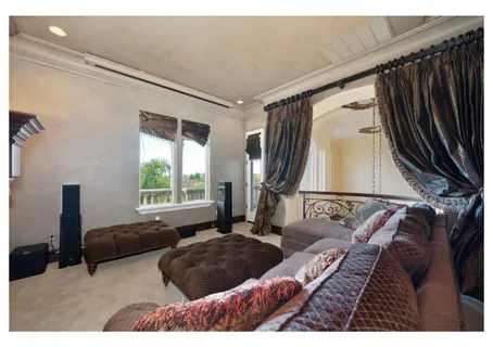a bathroom with a granite countertop sink mirror and shower