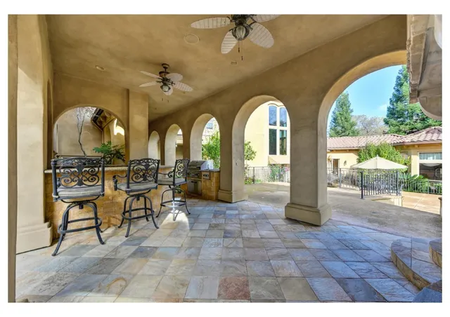 a aerial view of a house with a swimming pool