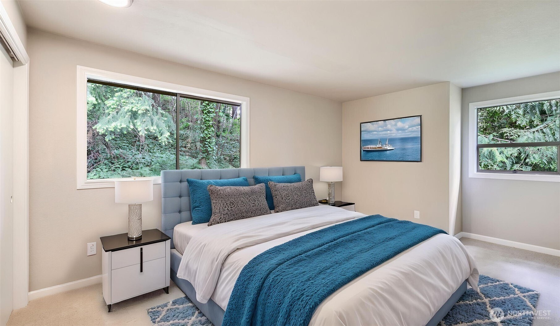 17606 Northeast 27th Street Redmond, WA 98052 - Photo 15 of 32 a bedroom with a large bed and a window