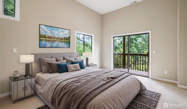 a bedroom with bed and a window