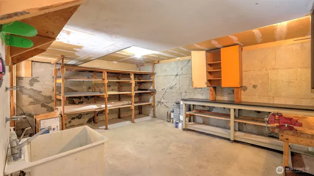 a view of an empty room and a window