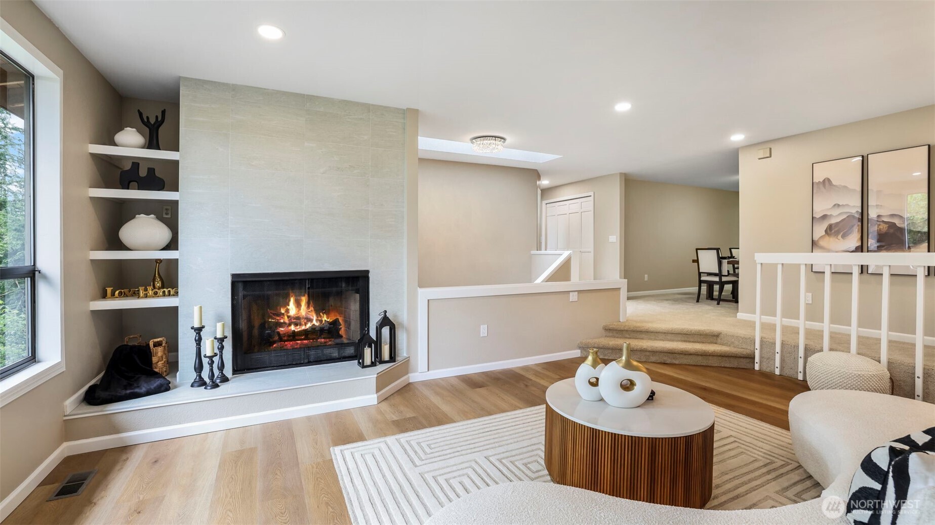 17606 Northeast 27th Street Redmond, WA 98052 - Photo 4 of 32 a living room with furniture and a fireplace