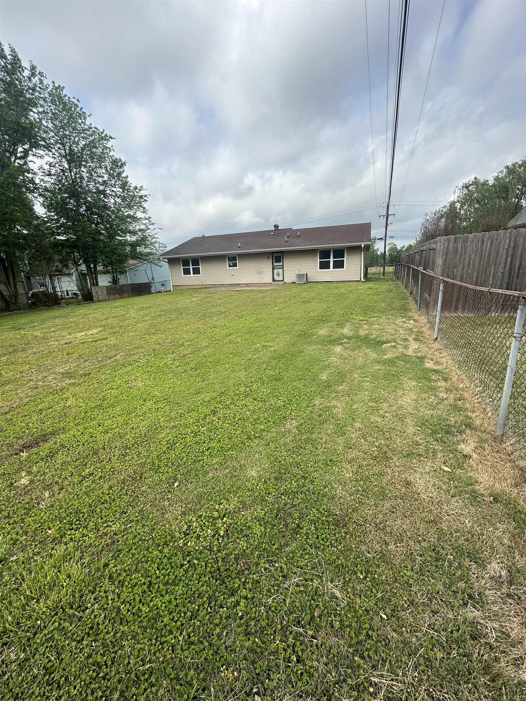 7882 Quito Road Millington, TN 38053 - Photo 8 of 9 a view of a big yard with large trees