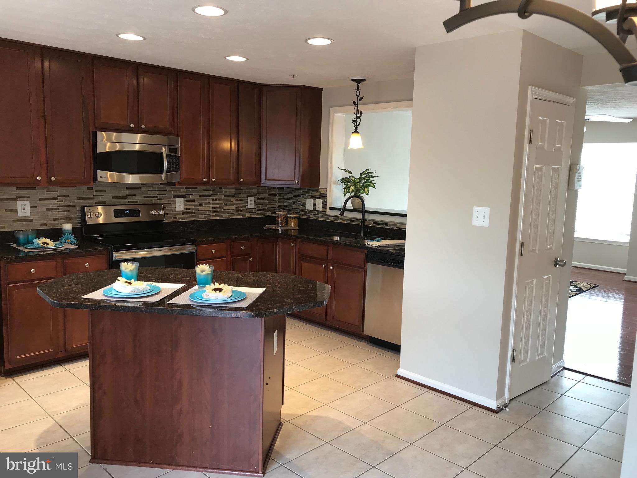 9884 Decatur Road Baltimore, MD 21220 - Photo 2 of 15 Beautiful Cherrh Cabinets