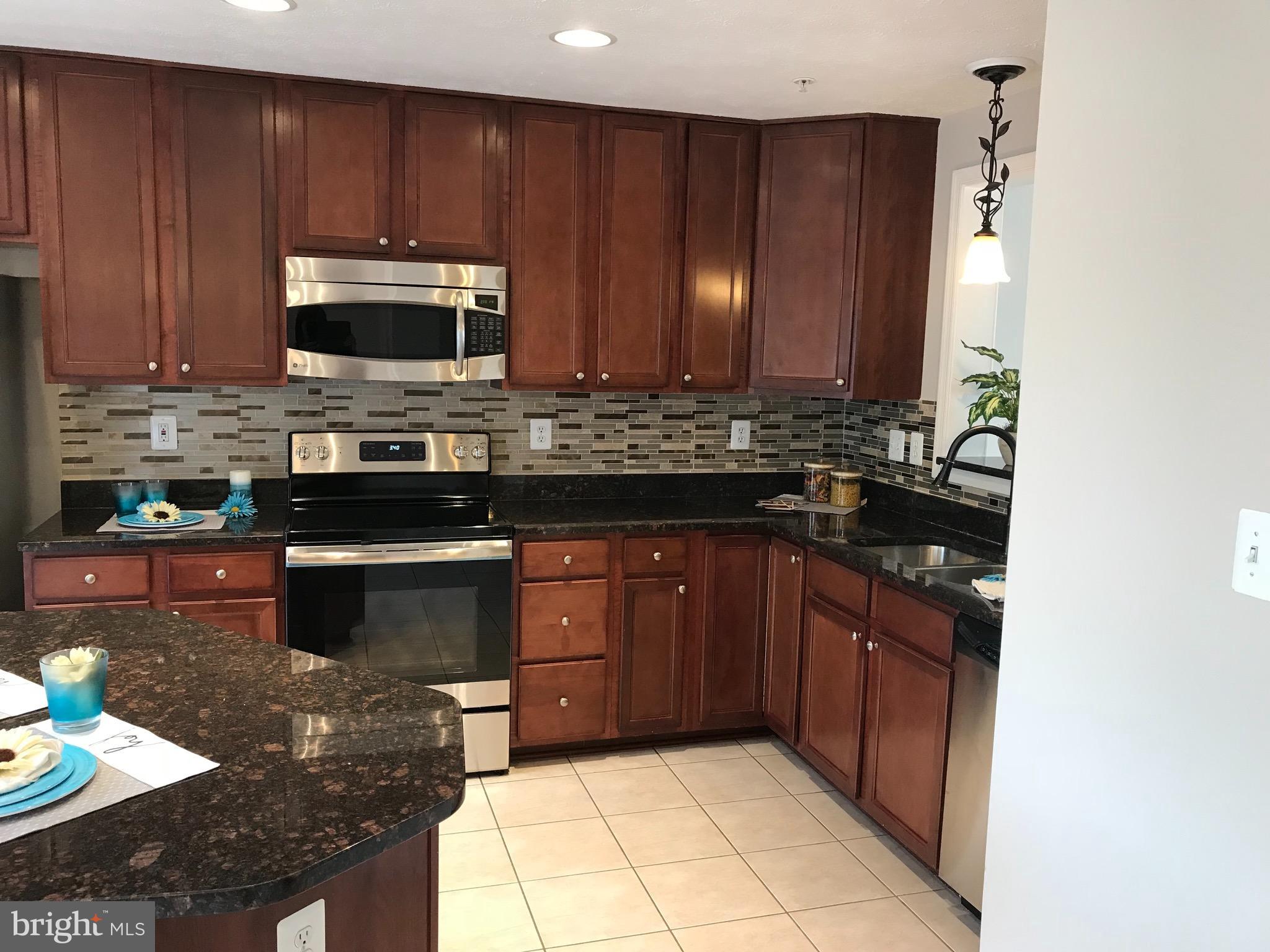 9884 Decatur Road Baltimore, MD 21220 - Photo 4 of 15 KNew stove, New Ref to be installed~ 9/18/18