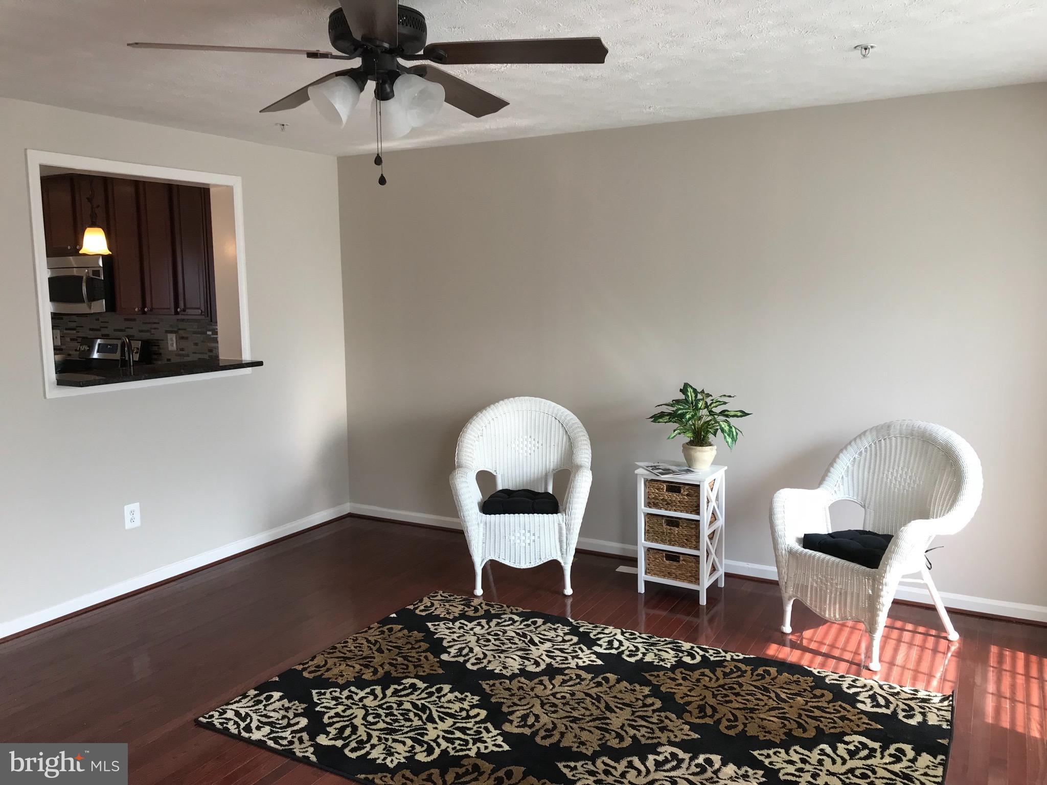 9884 Decatur Road Baltimore, MD 21220 - Photo 5 of 15 Beautiful Walnut Hardwood floors and bump out