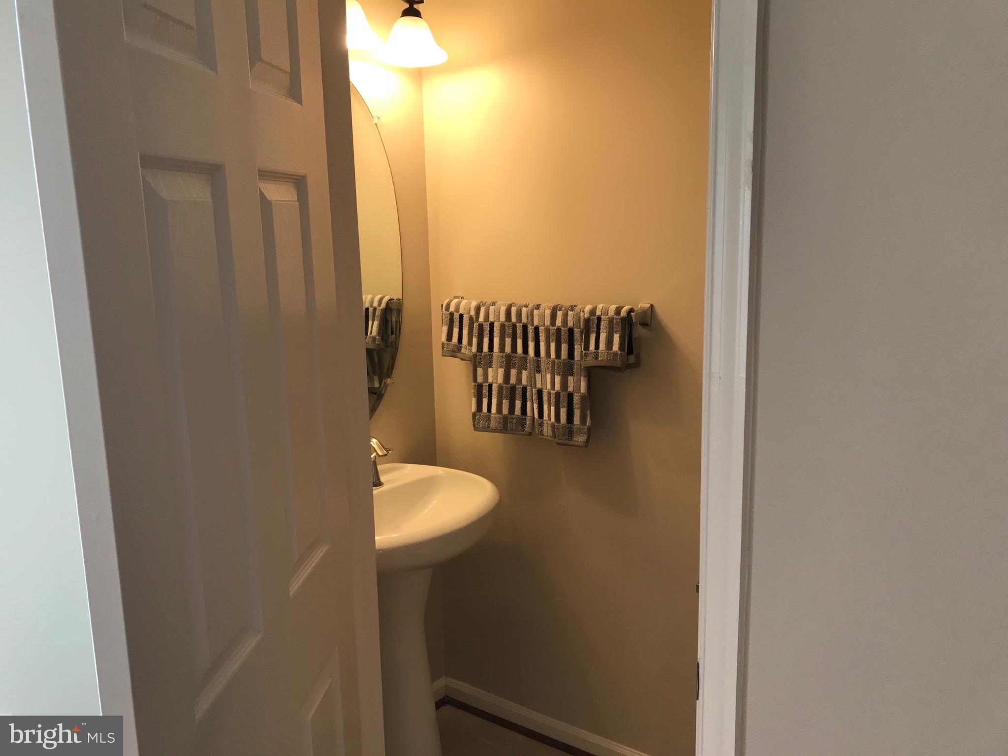 9884 Decatur Road Baltimore, MD 21220 - Photo 7 of 15 Mail level 1/2 Bath