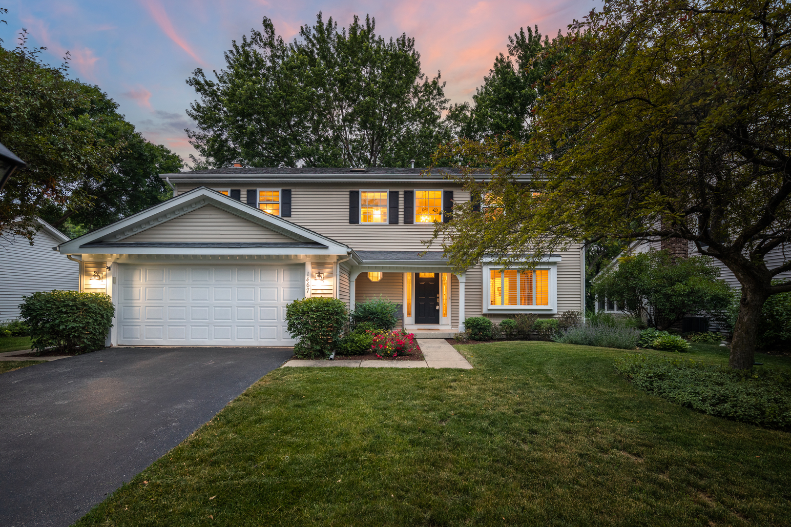 1467 Inverrary Drive Naperville, IL 60563 - Photo 1 of 2 a front view of a house with garden
