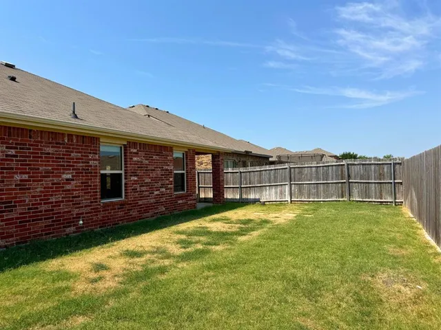 a view of a house with a swimming pool