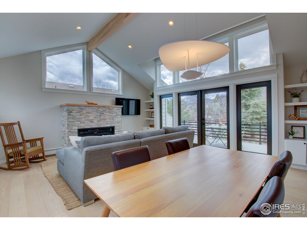 3035 Galena Way Boulder, CO 80305 - Photo 12 of 40 a large white kitchen with a large window