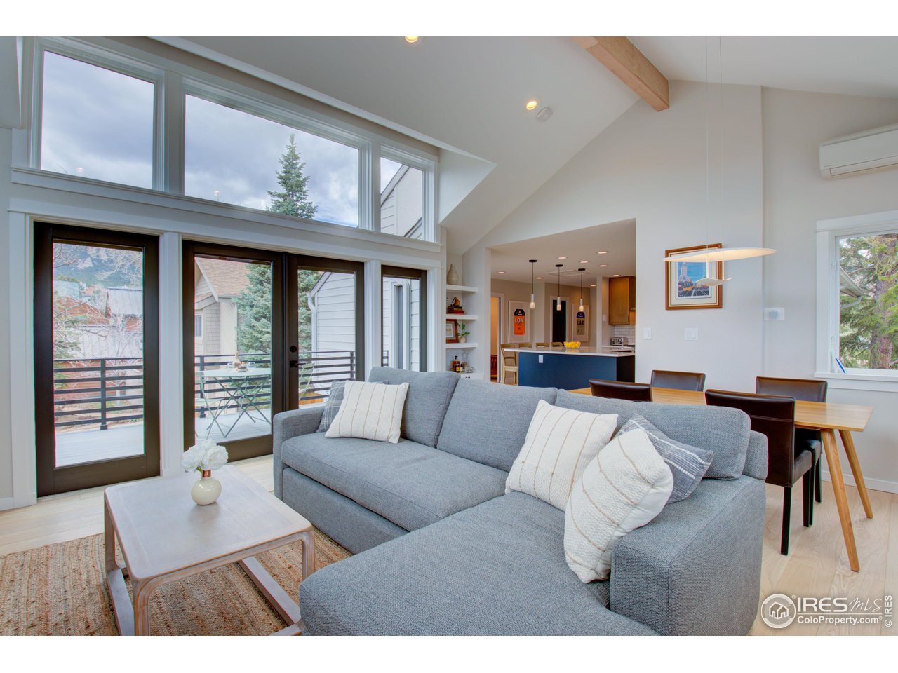 3035 Galena Way Boulder, CO 80305 - Photo 13 of 40 a living room with furniture and a large window
