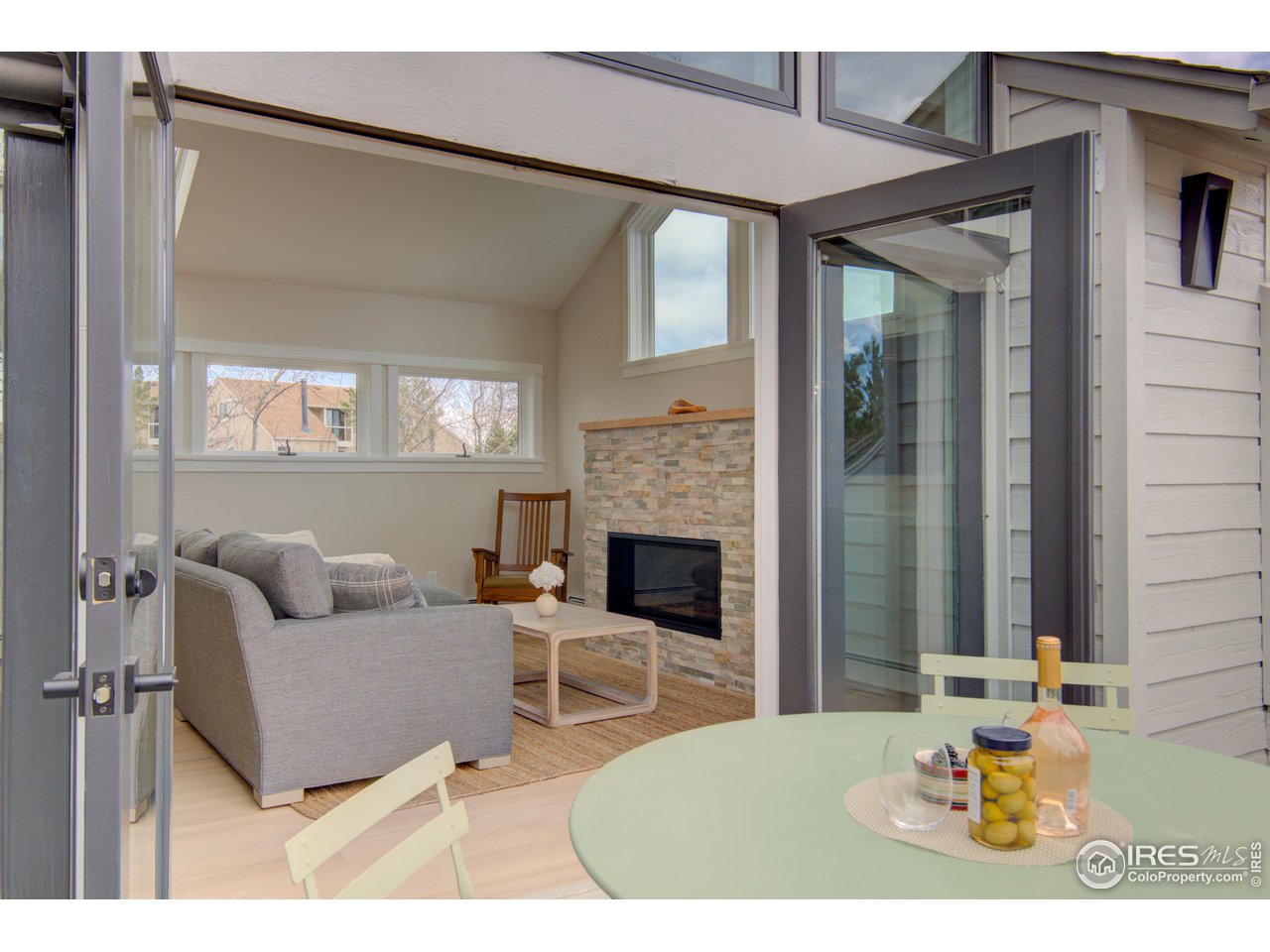 3035 Galena Way Boulder, CO 80305 - Photo 14 of 40 a living room with furniture and a fireplace