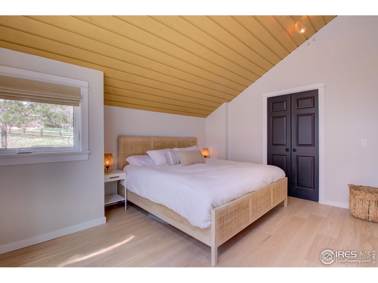 3035 Galena Way Boulder, CO 80305 - Photo 20 of 40 a bedroom with a bed and window