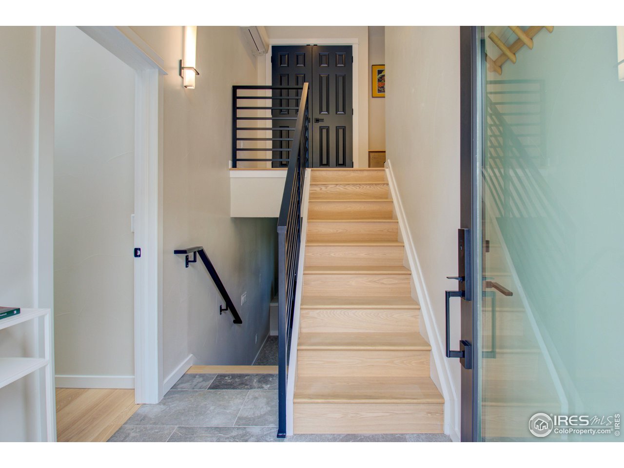 3035 Galena Way Boulder, CO 80305 - Photo 23 of 40 a view of entryway and hall with wooden floor