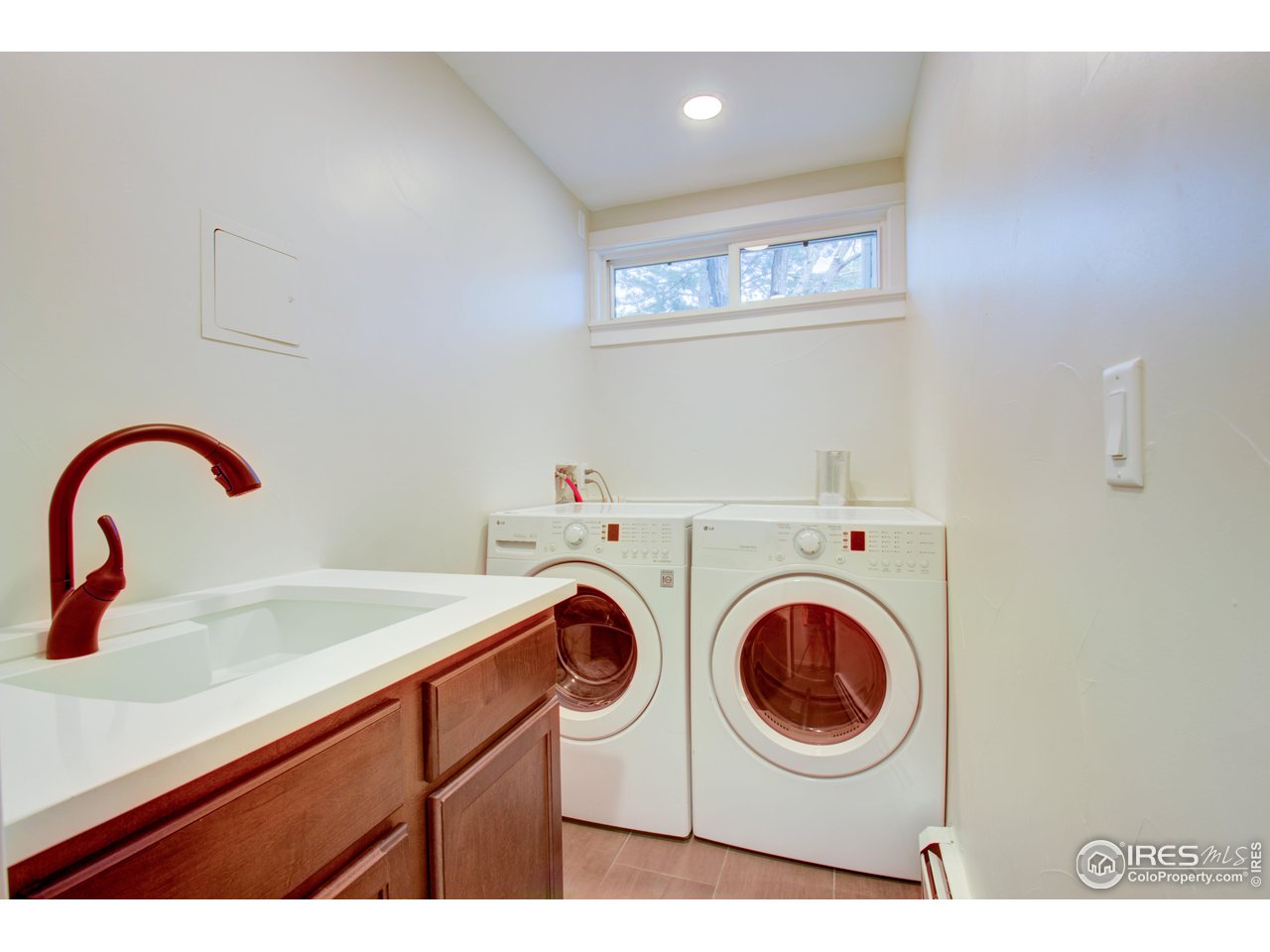 3035 Galena Way Boulder, CO 80305 - Photo 29 of 40 a utility room with dryer and washer