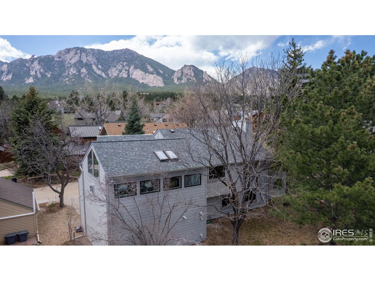 3035 Galena Way Boulder, CO 80305 - Photo 3 of 40 a balcony with furniture and a potted plant