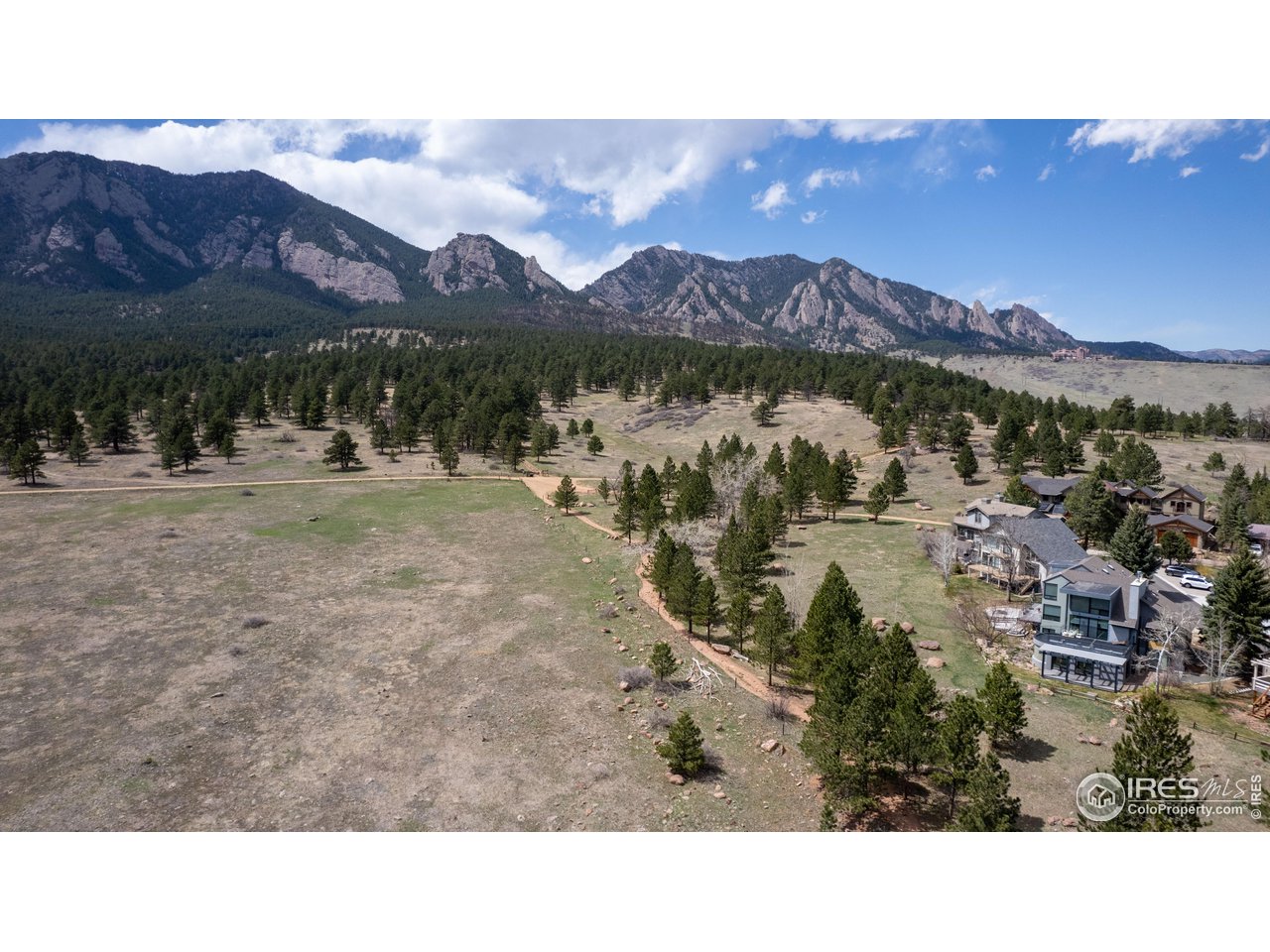3035 Galena Way Boulder, CO 80305 - Photo 35 of 40 a view of a town with mountains in the background