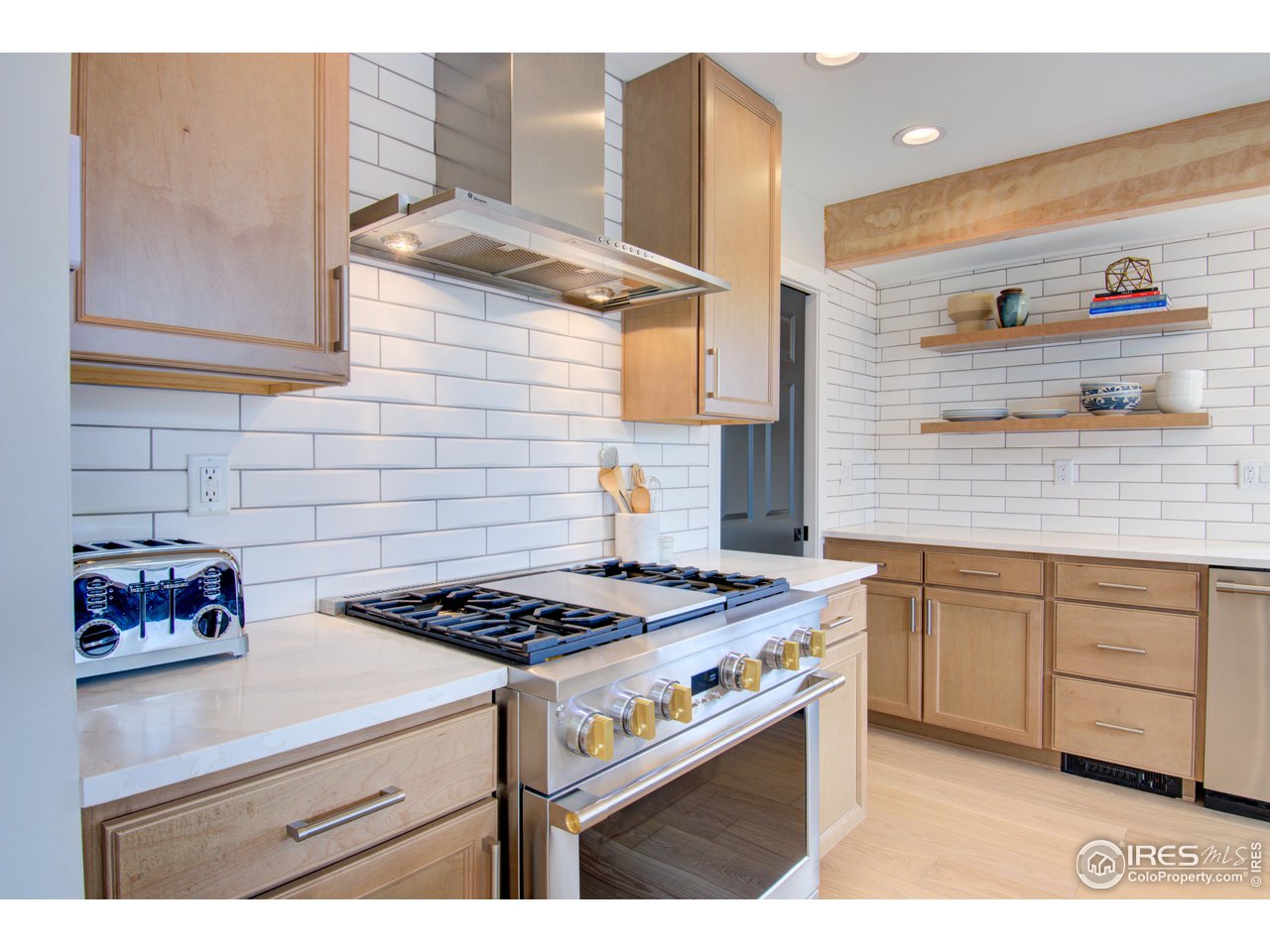 3035 Galena Way Boulder, CO 80305 - Photo 6 of 40 a kitchen with cabinets and stove