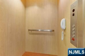 22 Vela Way Edgewater, NJ 07020 - Photo 14 of 44 a bathroom with a shower