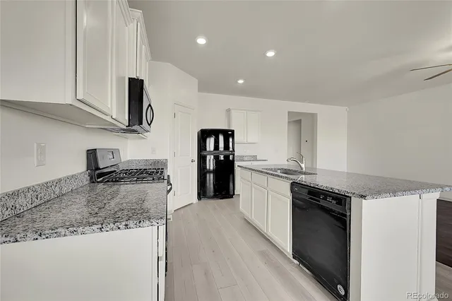 a view of parking garage with cars