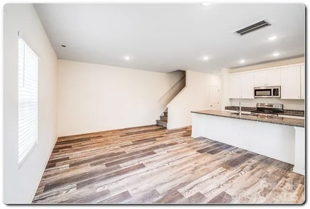 a view of kitchen and microwave