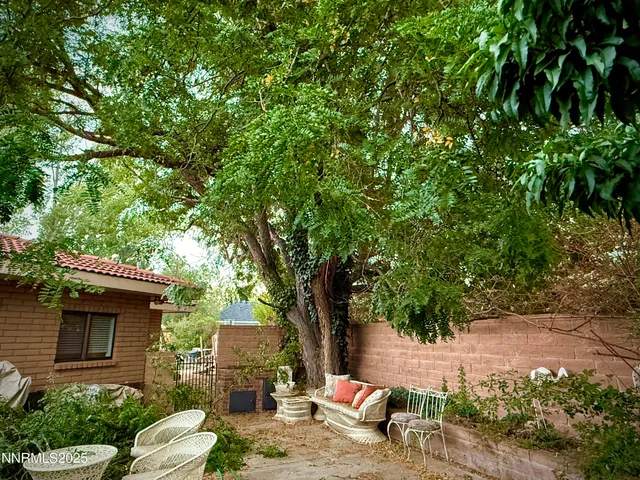 a backyard of a house with lots of green space