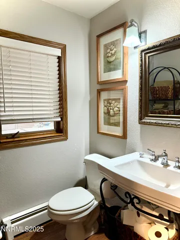 a view of front door with wooden floor