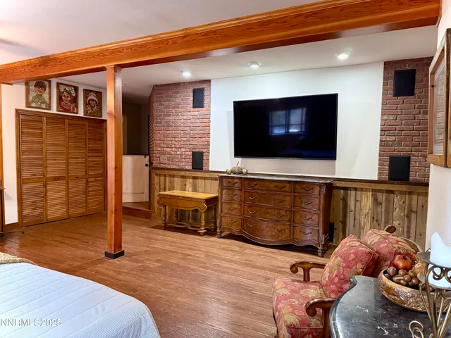 a view of balcony with wooden floor