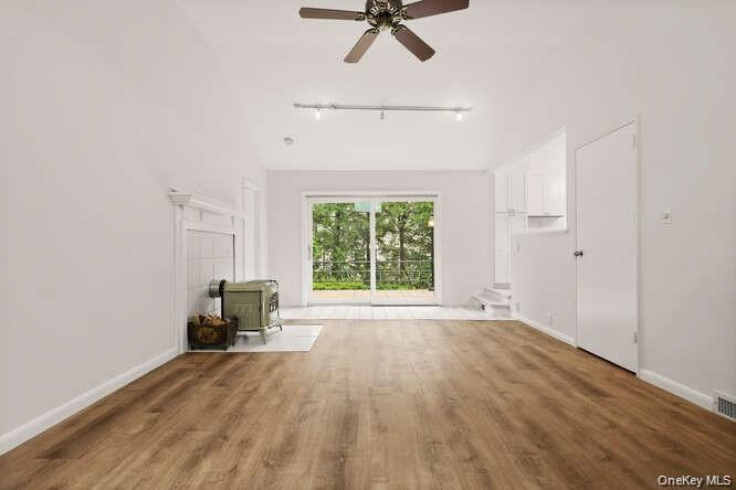 93 Seton Drive New Rochelle, NY 10804 - Photo 3 of 31 a view of room with a window and hardwood floor