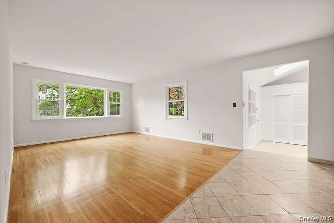 93 Seton Drive New Rochelle, NY 10804 - Photo 6 of 31 a view of an empty room with a window