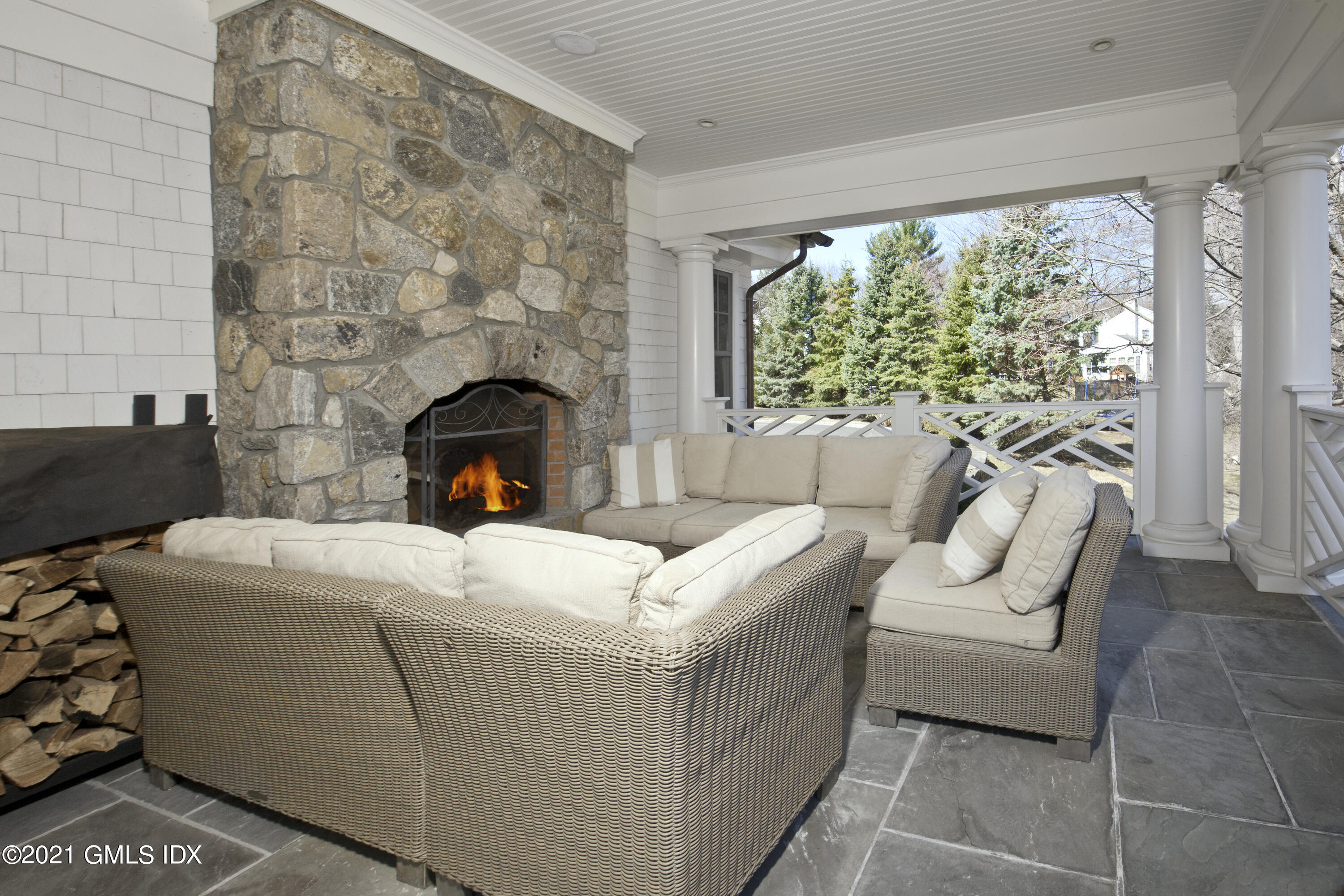 16 Dingletown Road Greenwich, CT 06830 - Photo 12 of 35 a living room with furniture and a fireplace