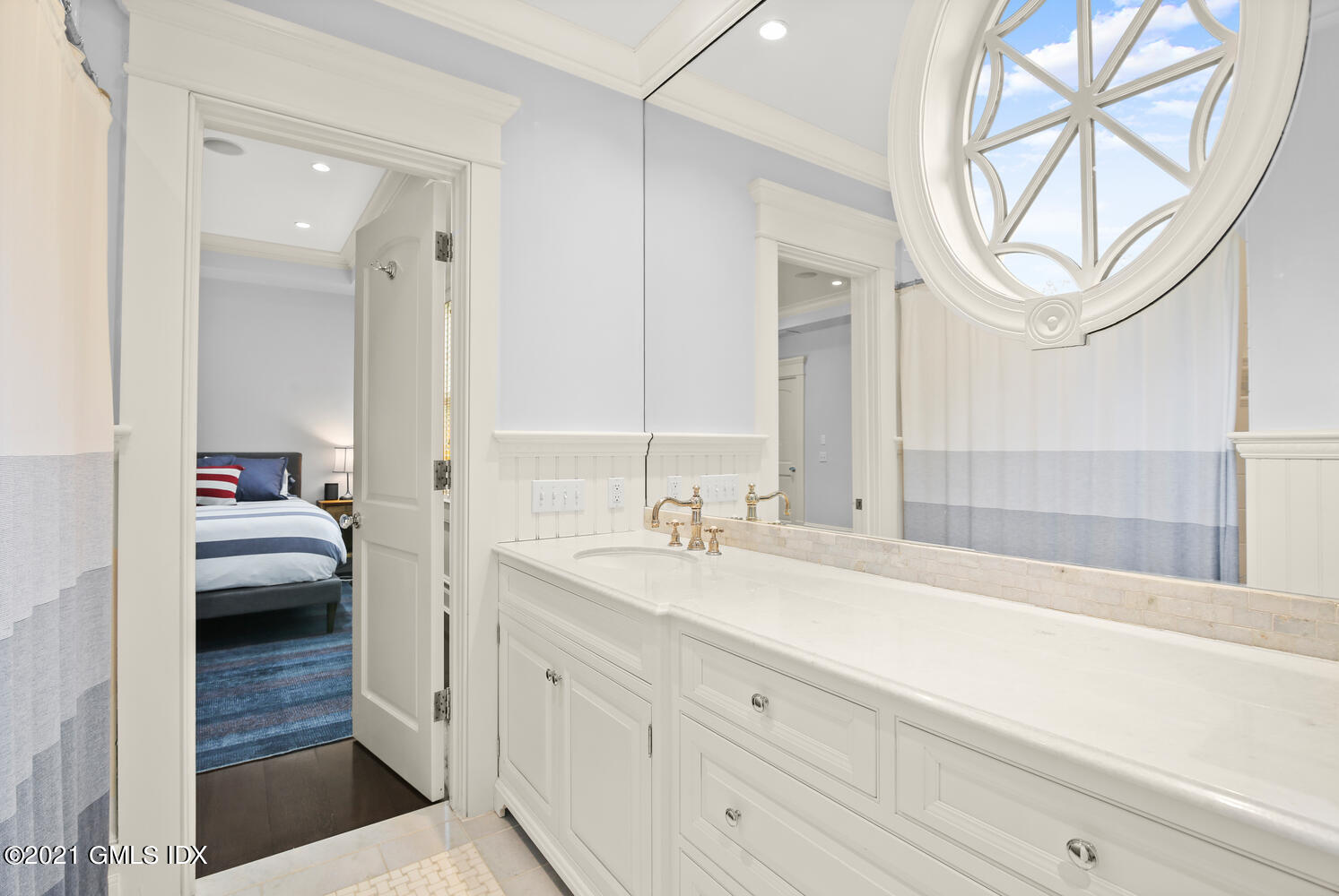 16 Dingletown Road Greenwich, CT 06830 - Photo 20 of 35 a en suite bathroom with a granite countertop sink and a mirror