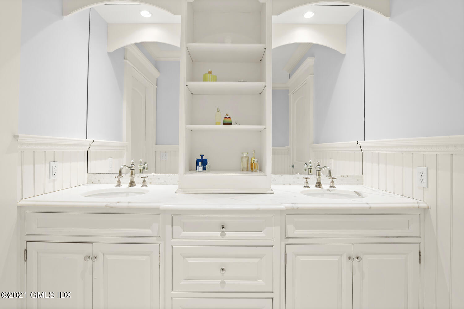 16 Dingletown Road Greenwich, CT 06830 - Photo 29 of 35 a bathroom with double sink and a mirror