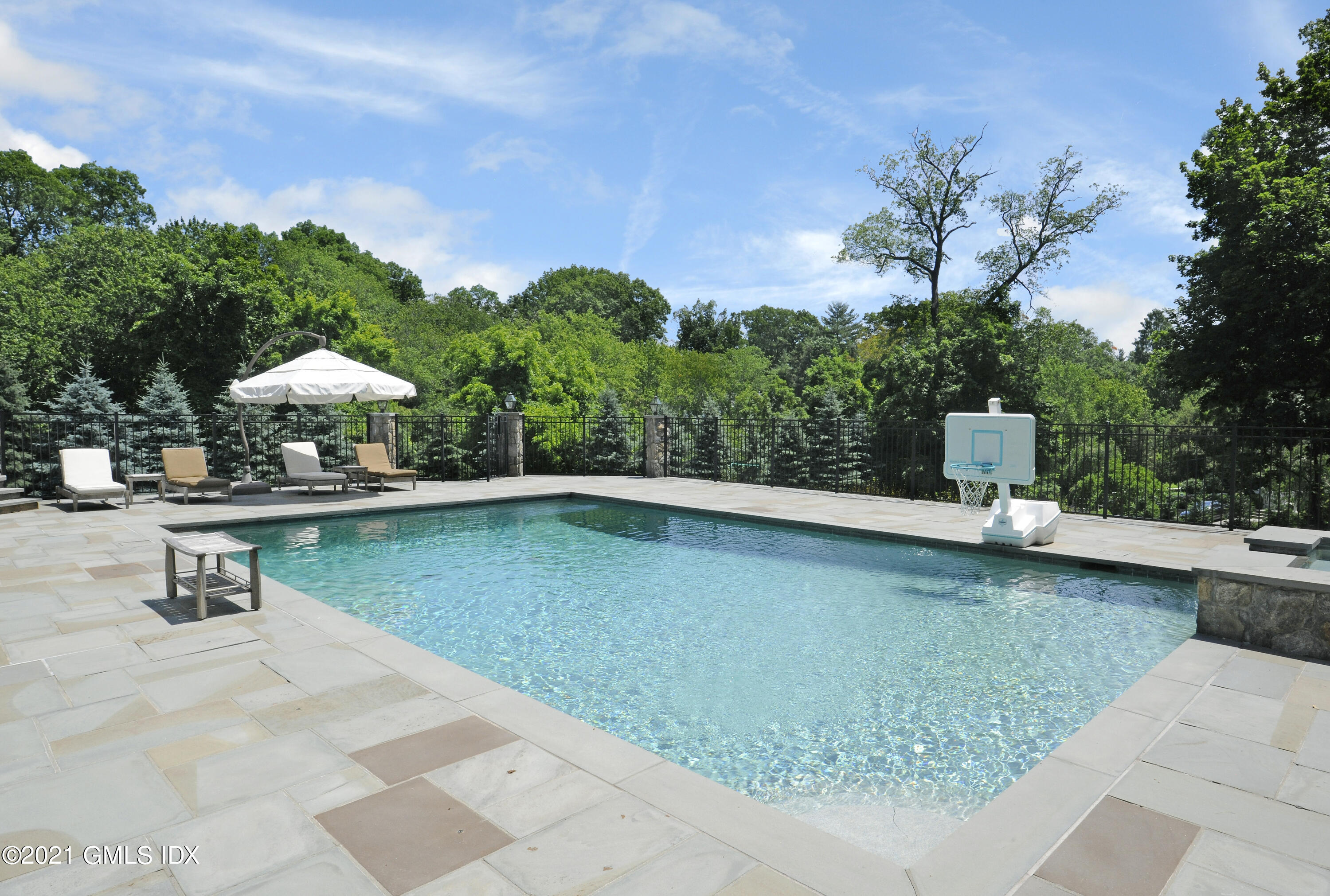 16 Dingletown Road Greenwich, CT 06830 - Photo 31 of 35 swimming pool view with a seating space