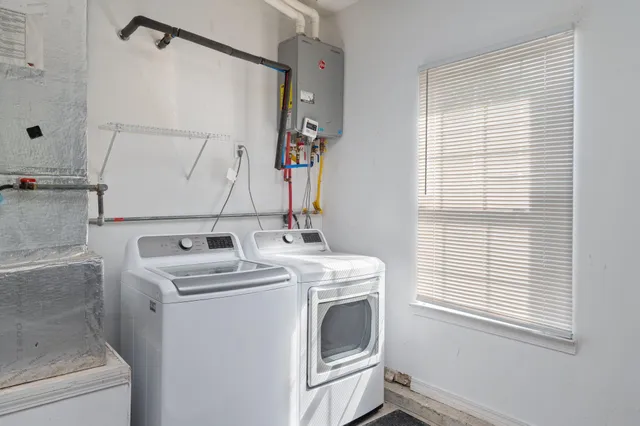 a utility room with dryer and washer