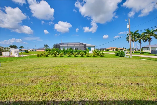 a view of a big yard with an outdoor space